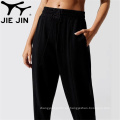 2020 JIEJIN OEM Fashion Mujeres personalizadas Pantalones negros para mujeres Gimnasio Jogger Pantalones